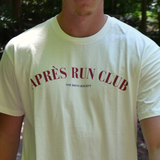 Closeup of athletic man wearing swith apres run club crewneck tee with graphics and text on the front