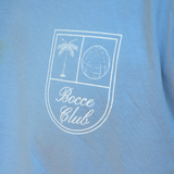 Closeup of Swith bocce club crewneck tee crest with palm tree and bocce call