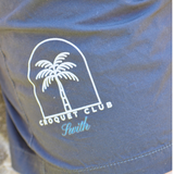 Logo of swith croquet club with palm trees on a blue background