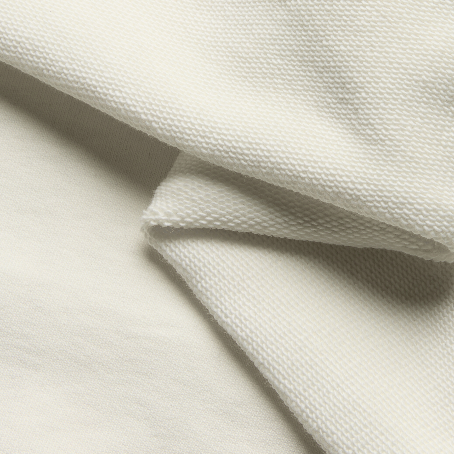 Close-up of cotton French Terry fabric in the color natural